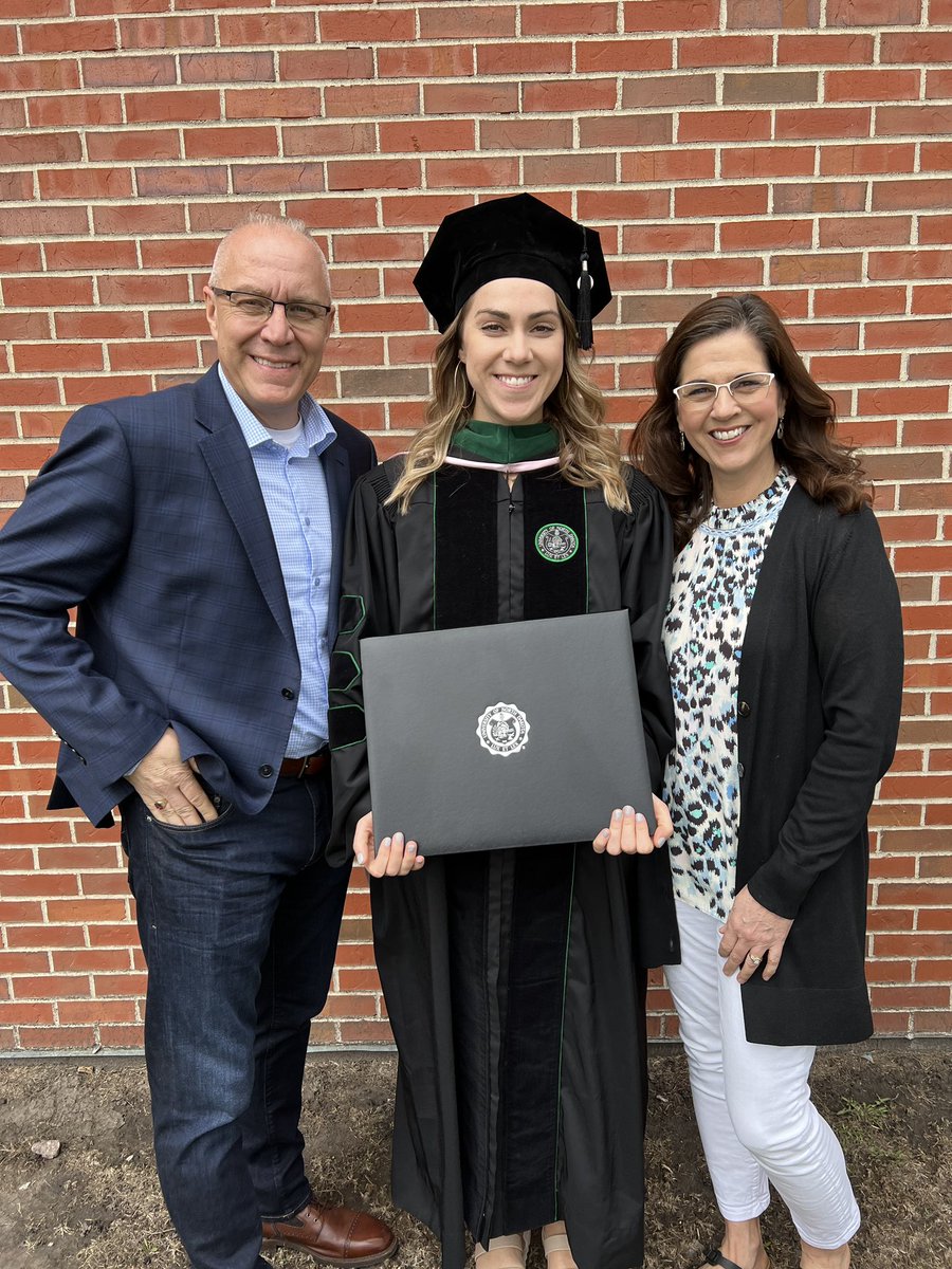 strand_brad's tweet photo. So proud of  @BaileyStrand 
We had such a fun weekend celebrating as she became a Dr of PT! We got to “hood” her on Friday and watch her receive her diploma with her class on Saturday morning! What an awesome journey at UND graduating with a BS, MA and DPT. #3Degrees #+Hoops🏀 https://t.co/AZb4nx3ab0