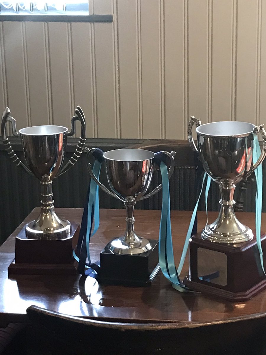 TownfcCq's tweet photo. What a day/night, a 1-0 win in a close encounter with @penyfforddfc sees the Town win their treble 🏆🏆🏆 and tonight we’ve celebrated with all 3 trophies https://t.co/qVWNaIohH4
