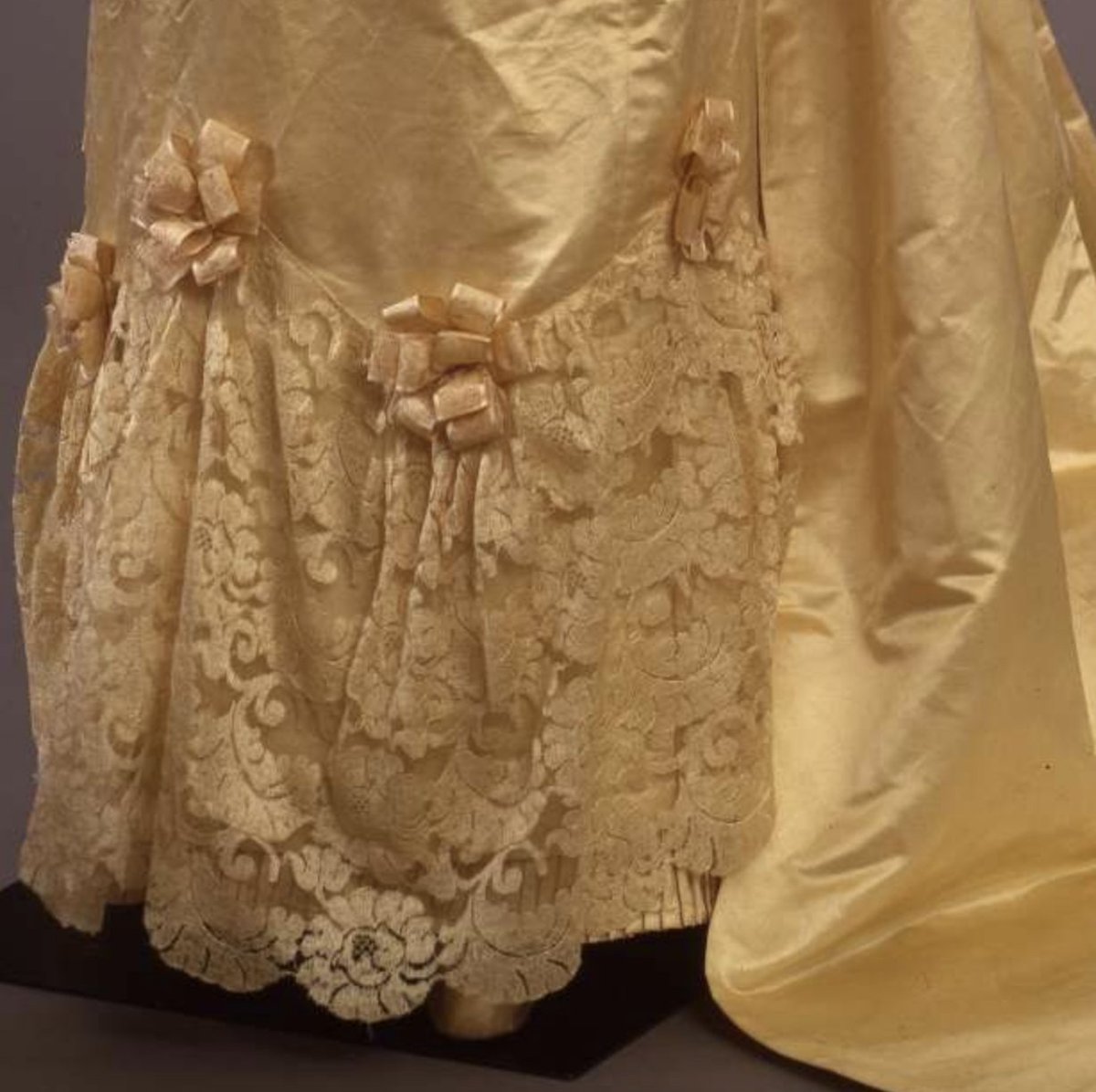 Today's #ootd is this 1890-5 ivory silk satin wedding dress with blonde lace trimmings and rosettes. The dress is what the object description called 'overcolored,' suggesting that the color got darker with age. Still stunning! #Gildedglamour #PittiPalace #Fashionhistory