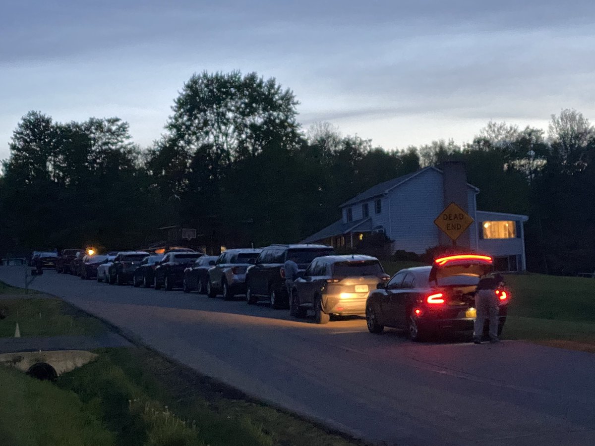 AndrewDonovan's tweet photo. There are at least 15 police cars lined up outside the home of suspected white supremacist and Buffalo shooter Payton Gendron, including New York State Police and Bureau of Alcohol, Tobacco, Firearms. https://t.co/Jp2VLMLgRy
