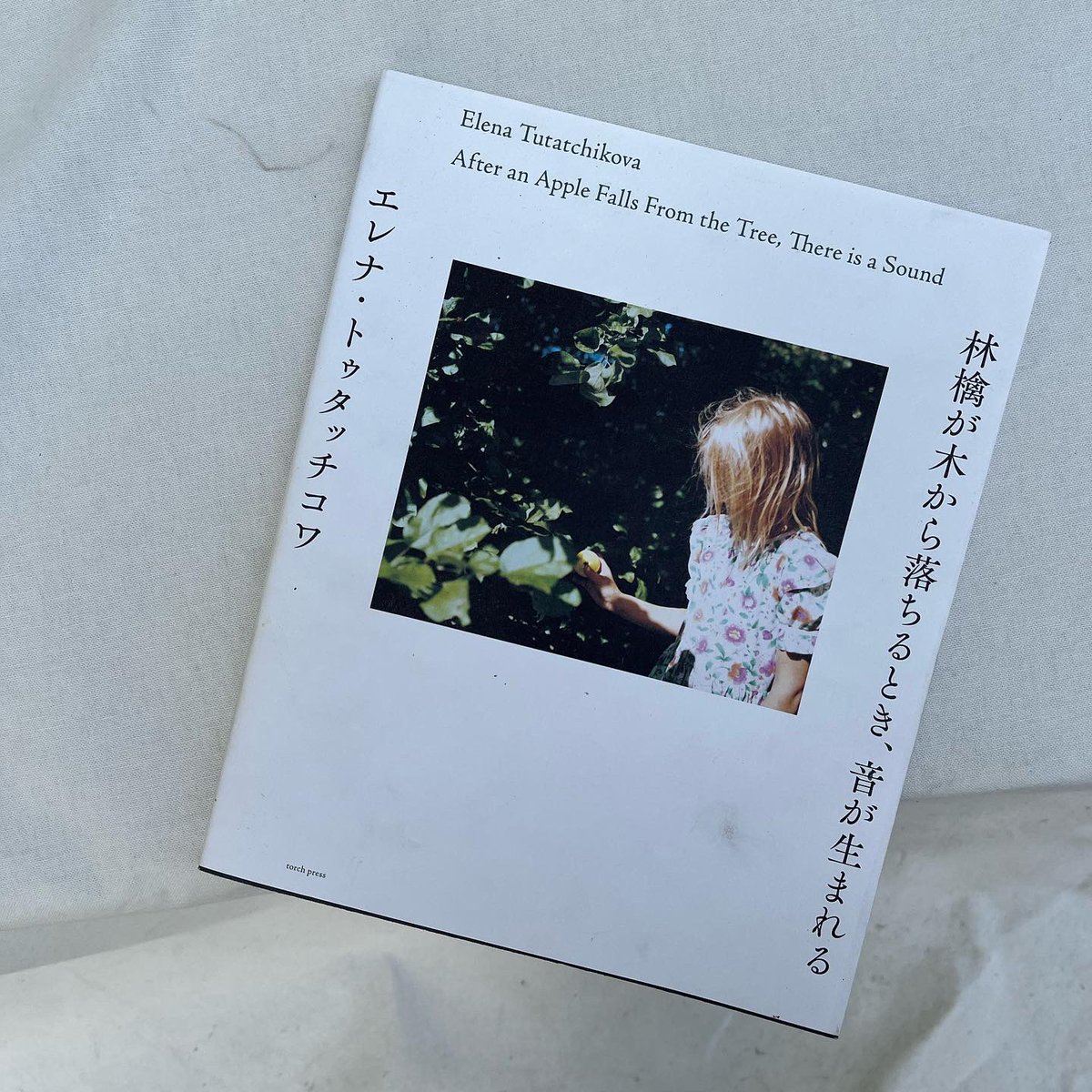 storage_huam's tweet photo. torch press에서 발행한 <After an Apple Falls From the Tree, There is a Sound / Elena Tutatchikova> 책방에 입고 되었습니다. 아름다운 사진집 입니다. 💙 https://t.co/HBzxRY6rIn