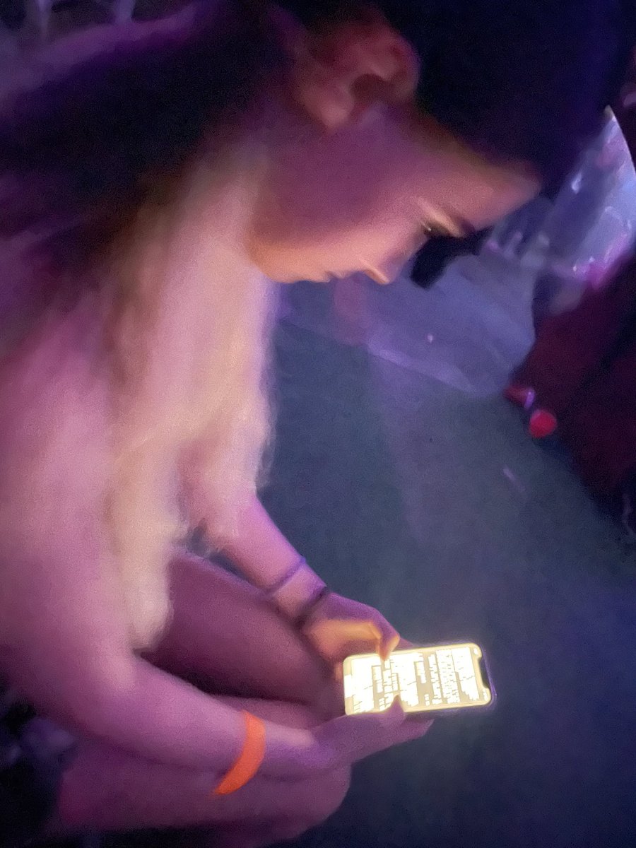wet_foal's tweet photo. coco is wearing a glittery pink burzum shirt, searching Mayhem ao3 at the hyperpop gig https://t.co/zmFNuxhRCb