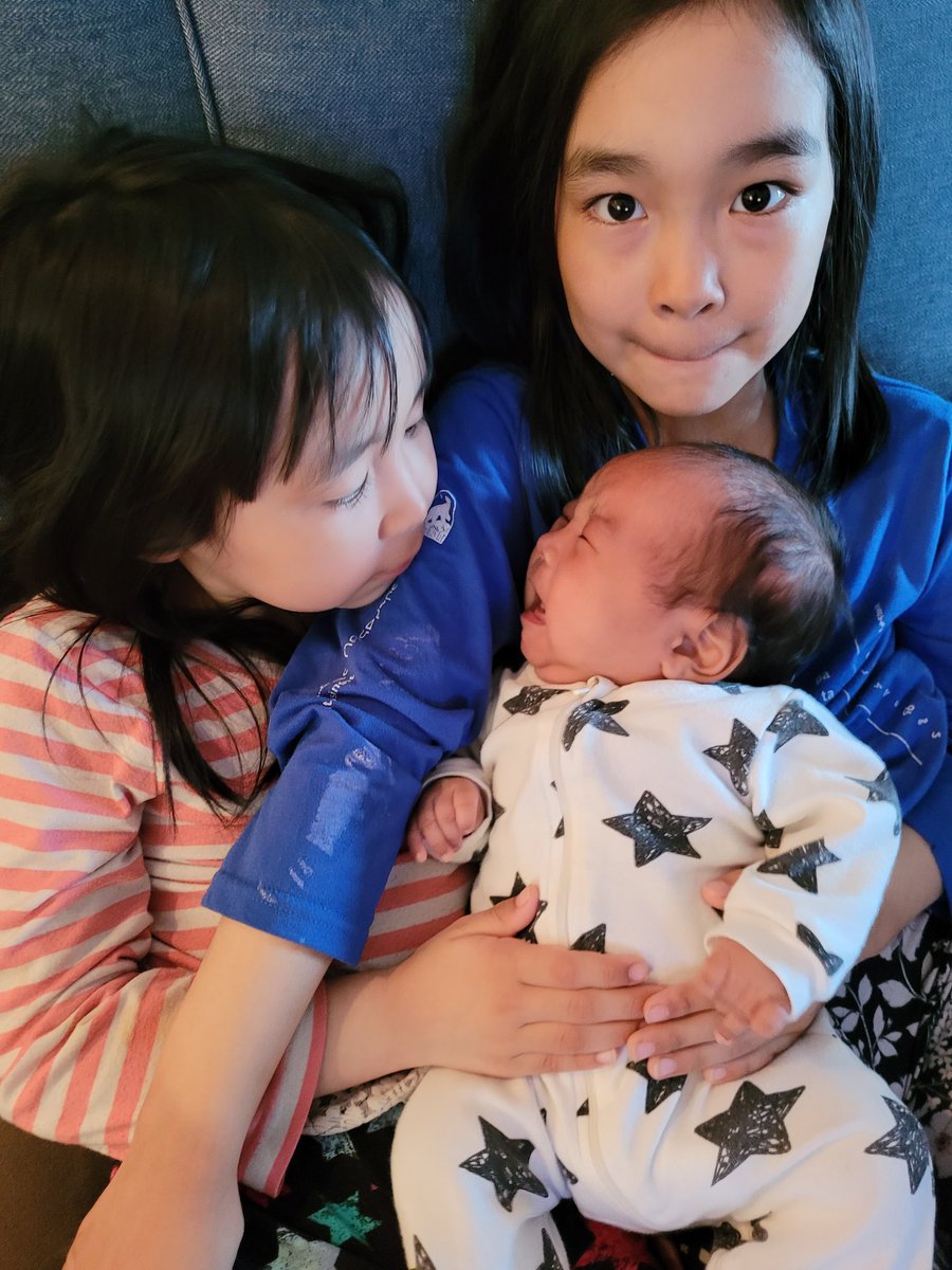 The girls just love their little sister 💕