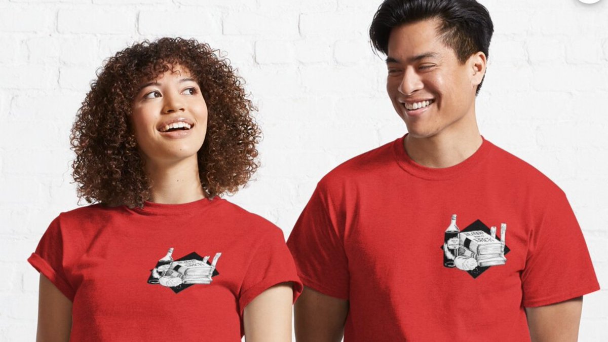 two people wearing red t-shirts with the design.