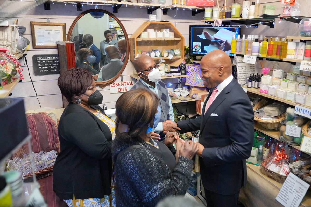 Mayor Adams greets staff at a small business in Brooklyn.