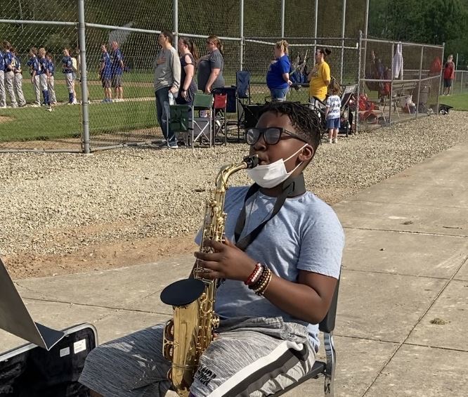 Ranger 6th grade student Isaiah Quainoo played the Star Spangled Banner on his alto saxophone at a recent Warren baseball/softball event held at Raymond Park.
