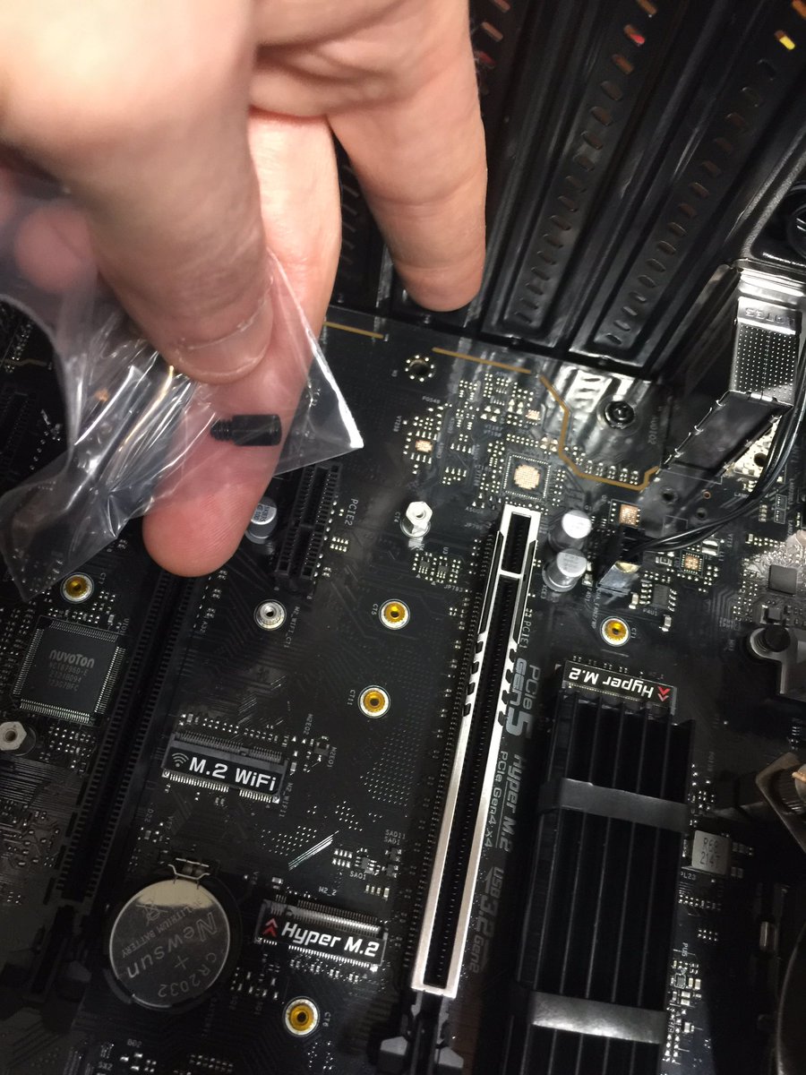 GameDevMicah's tweet photo. Ooops I missed a bolt... a support bolt, a #pci5 mobo support slot on the #asrock #z690 #ddr5 board... I couldn’t find it and so didn’t want to get one of my own if it wasn’t provided... (aka might harm it) but found this little bag lol 😆 #ue5 #gamedev https://t.co/6Xnq5FiYVl
