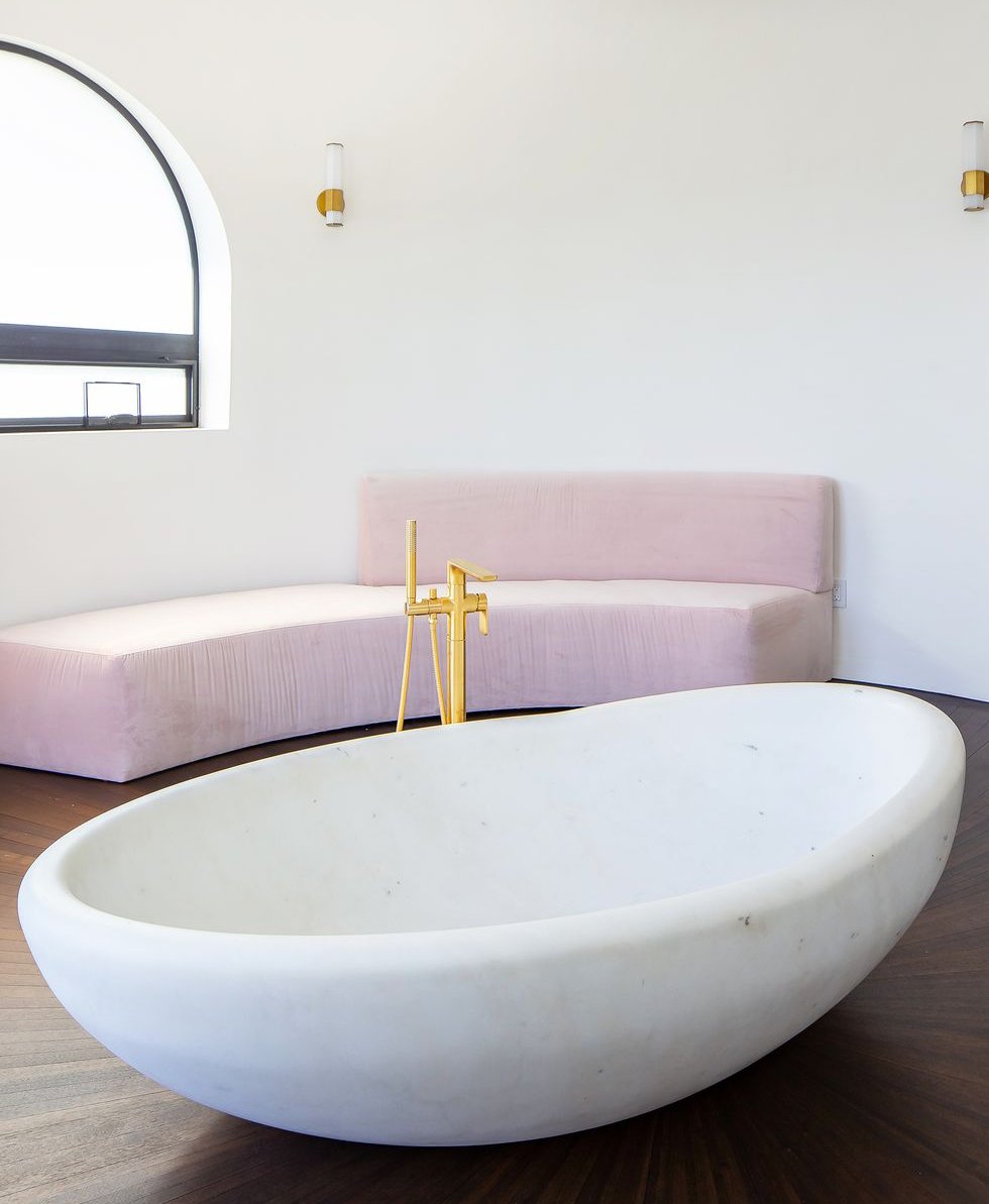 Make your bathroom feel extra luxe with sophisticated seating and a grand floating tub in the center of the room. Bathroom by Breegan Jane. More inspo here zcu.io/xqBG