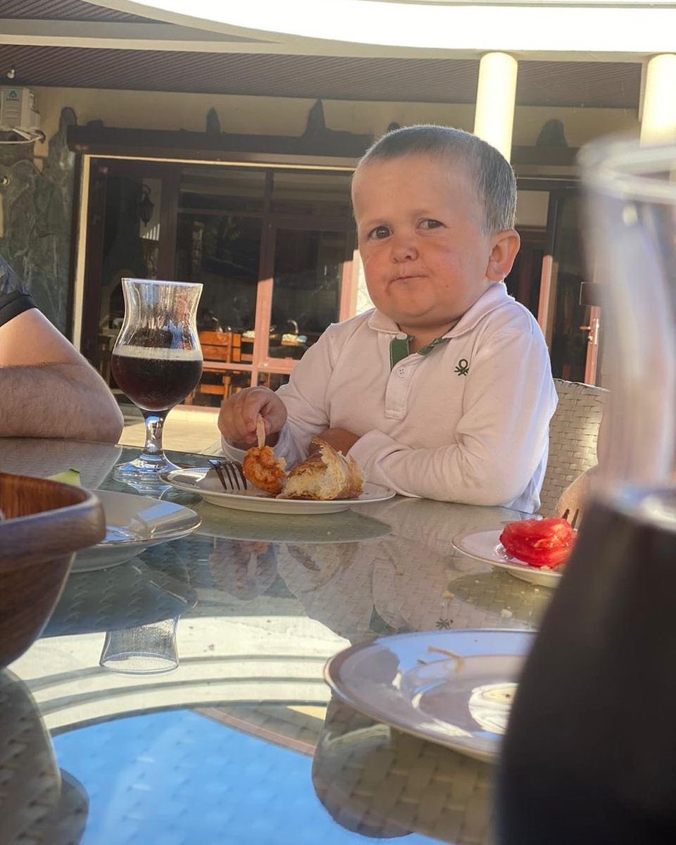 Waiter: “The Gentleman behind you bought you this drink”

The Gentleman behind you: