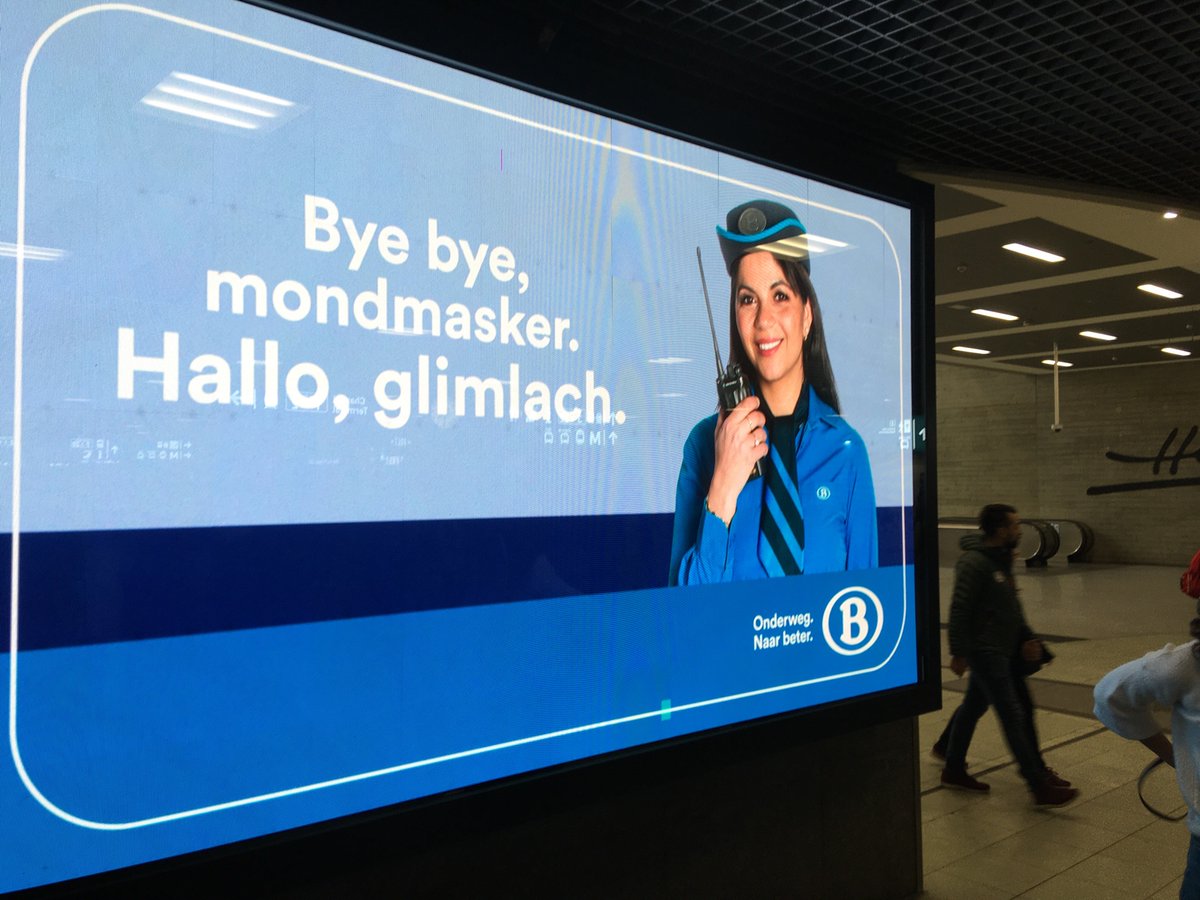 “Bye bye masks, hallo smile!” in Brussels South station, as Belgium 🇧🇪 lifts Covid restrictions - Dutch and French versions @Viral_Archive