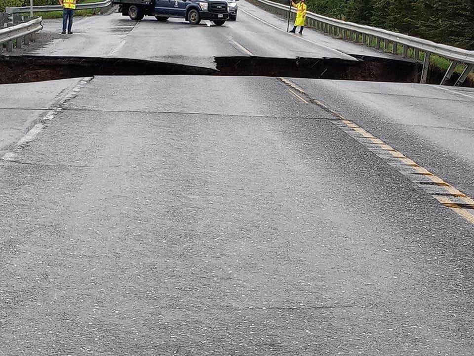 NWSCaribou's tweet photo. Route 1 in Cyr Plantation has fully collapsed due to flooding near Abel Cyr Road. @MaineDOT1 is on scene and has Closed the road. #MEwx Photo credit: Christi Belanger https://t.co/KDd2cNvr7r