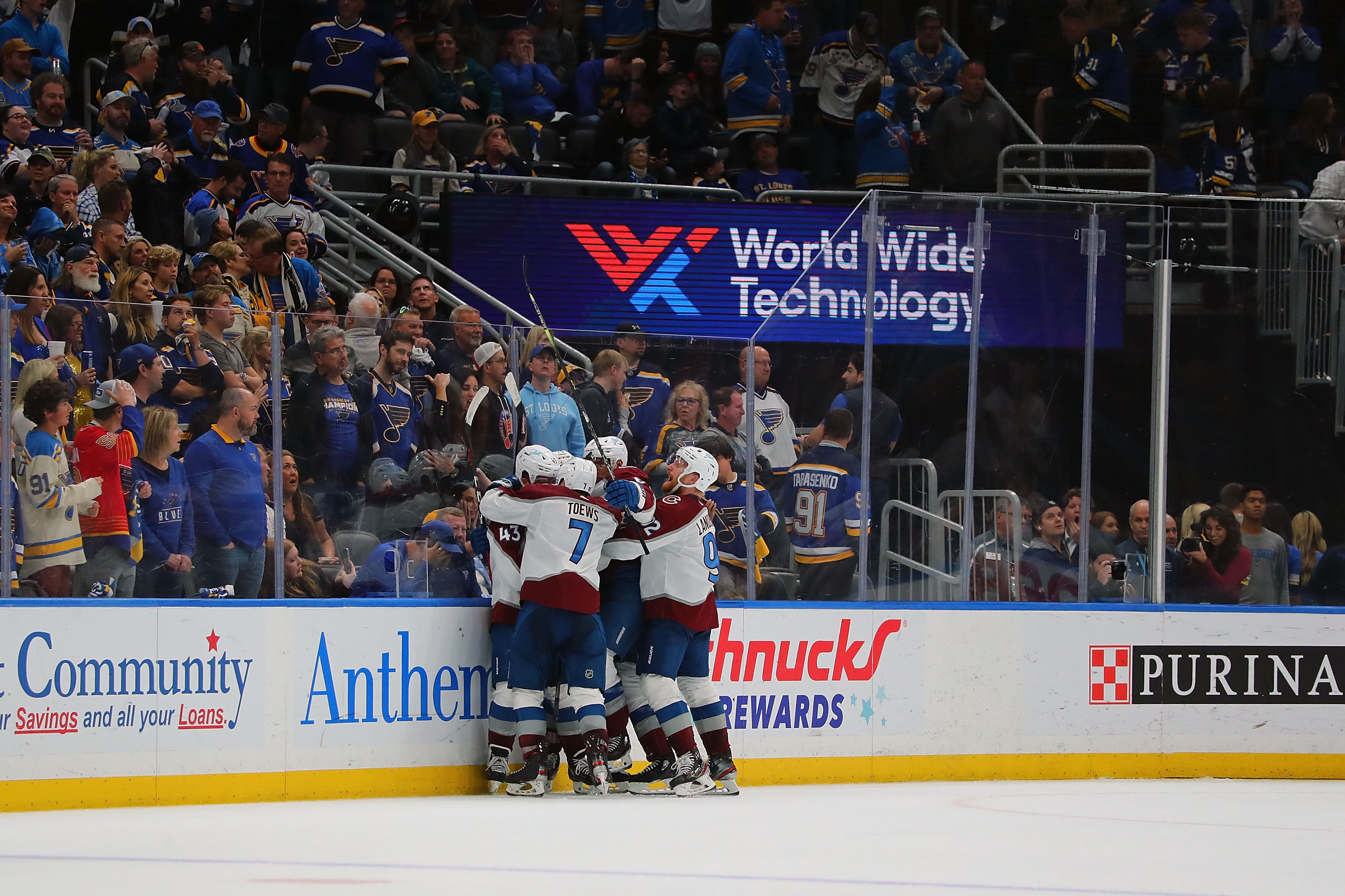The guys hugging Helm along the boards after he scored the game winning goal!