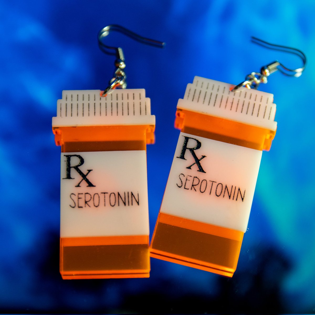 Positivelygeek_'s tweet photo. There is nothing wrong with getting your Serotonin from a bottle 😊
#serotonin #acrylicearrings https://t.co/rJ39gnj8qv