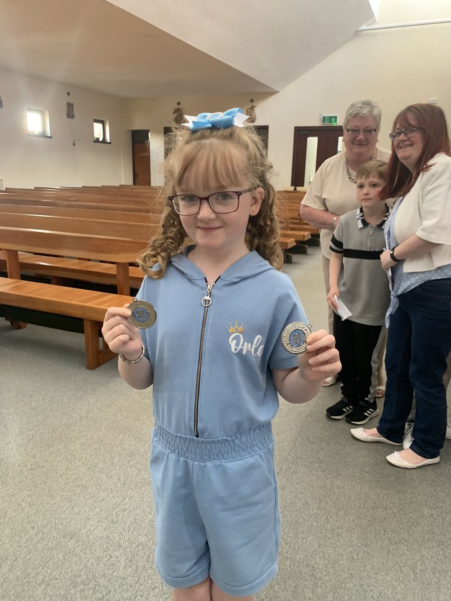StDavidsParish's tweet photo. The children enjoyed their Liturgy tonight. Orla was showing us her medals she won at Irish Dancing. Well done Orla.@StDavids4 @CamillaMinnis https://t.co/RBP3Ccjzzo