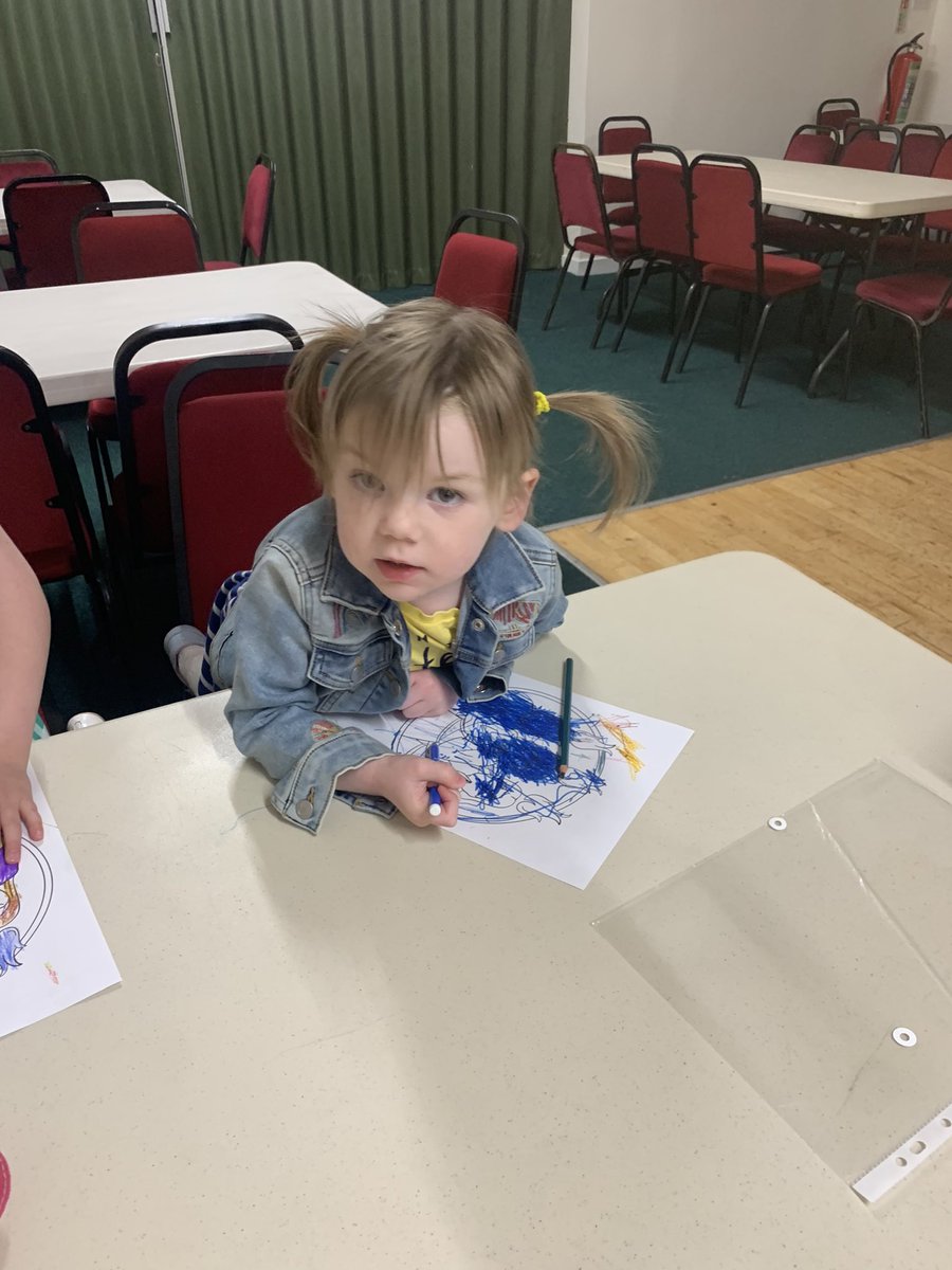 Bonny, Chloe and Emily all happily colouring their pictures for Pentecost