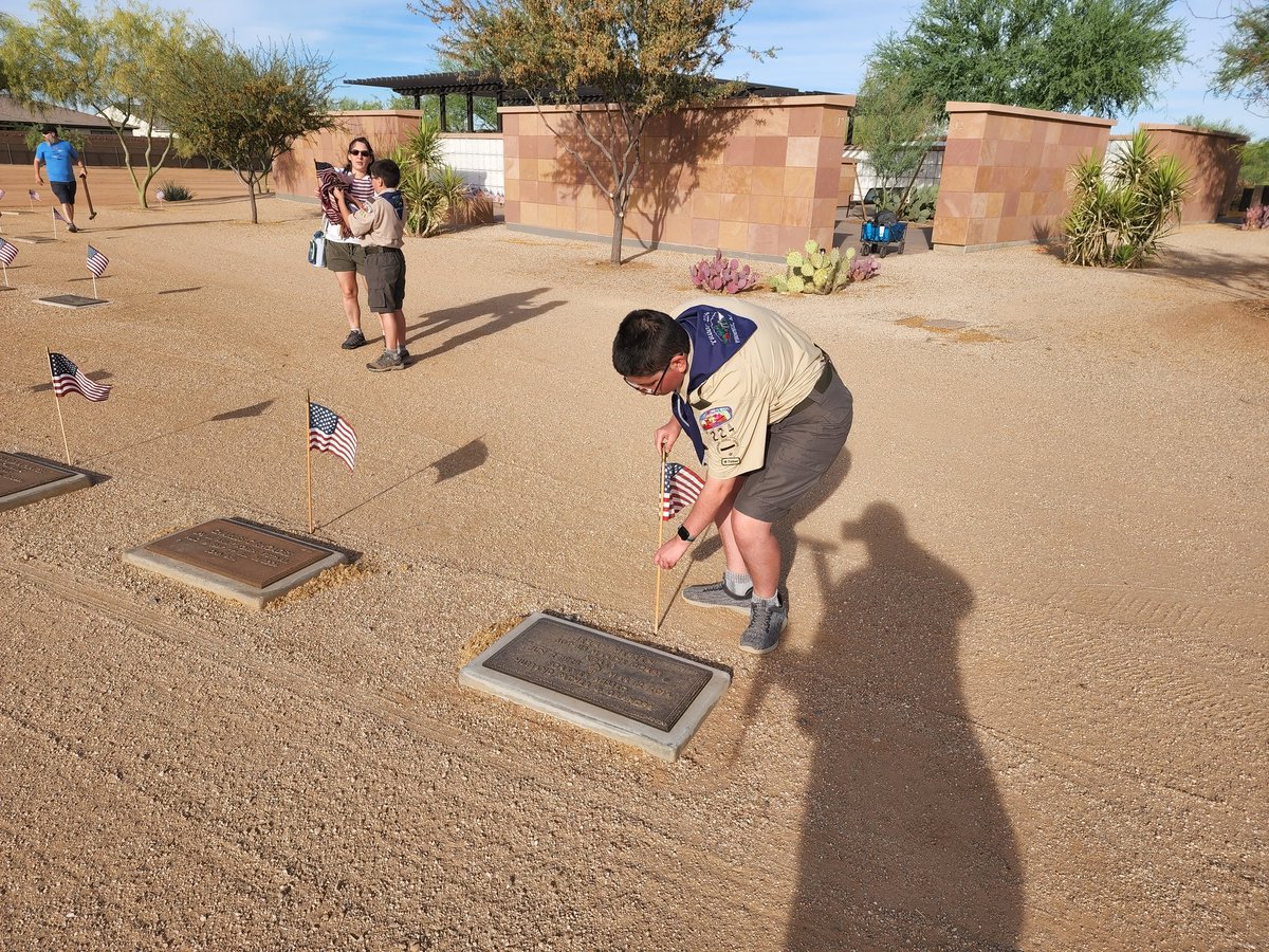 rhernandezpilot's tweet photo. Enjoyed spending the morning with both my boys, who are boy scouts, putting up flags at the National Memorial Cemetery of Arizona.  Covid halted this tradition the last 2 years.  Proud of them for getting up early to honor those who lost their lives in service to this country. https://t.co/H8fDIqLj2w