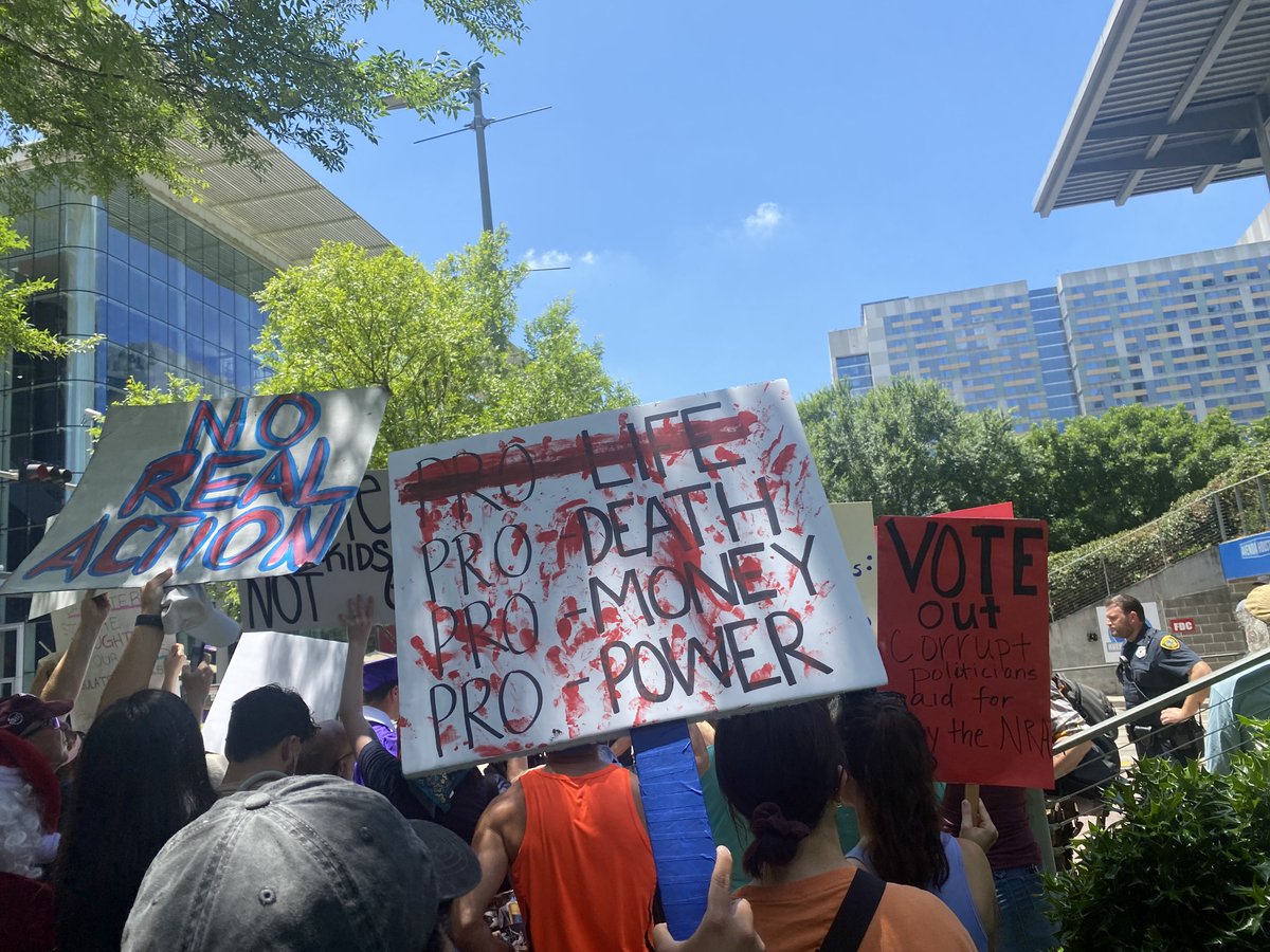 AldoButtazzoni's tweet image. Signs at the NRA protest today #NRAconvention #NRAprotest