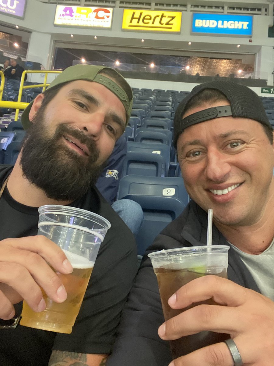 biger9's tweet photo. @TheCat151515 and I at game 6 of the @FL_Everblades game! Getting ready to watch @Johnny_Mack14 pass us both in all time games played! Nothing better than a game with a cocktail! #GoBlades https://t.co/DpboXnYAhU