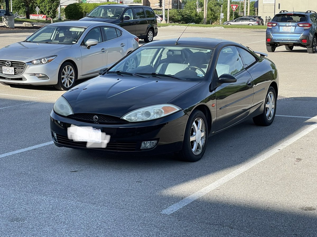 Hey <a href="/Car_Guy_Tom/">Tom Appel ™</a>, having a pretty good day. Check out this late 90s Cougar. When it rains it pours.  #carspotter <a href="/cgautomotive/">Consumer Guide Auto</a>