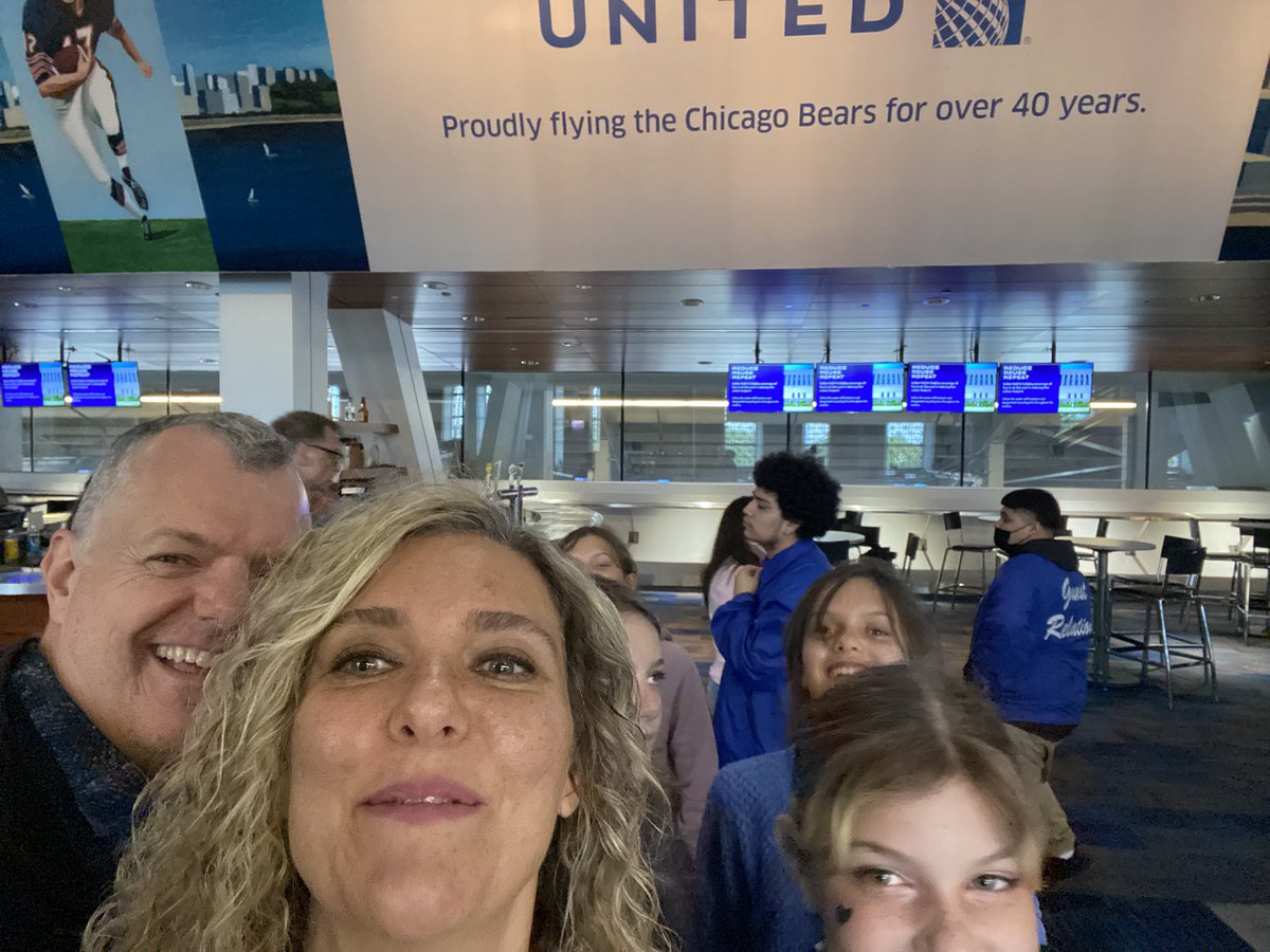 I_Fly_UA's tweet photo. Several attempts to take the right picture 😂. Soldier Field. United Club. Coldplay concert. Family. #beingunited https://t.co/JzOoRl0LAQ