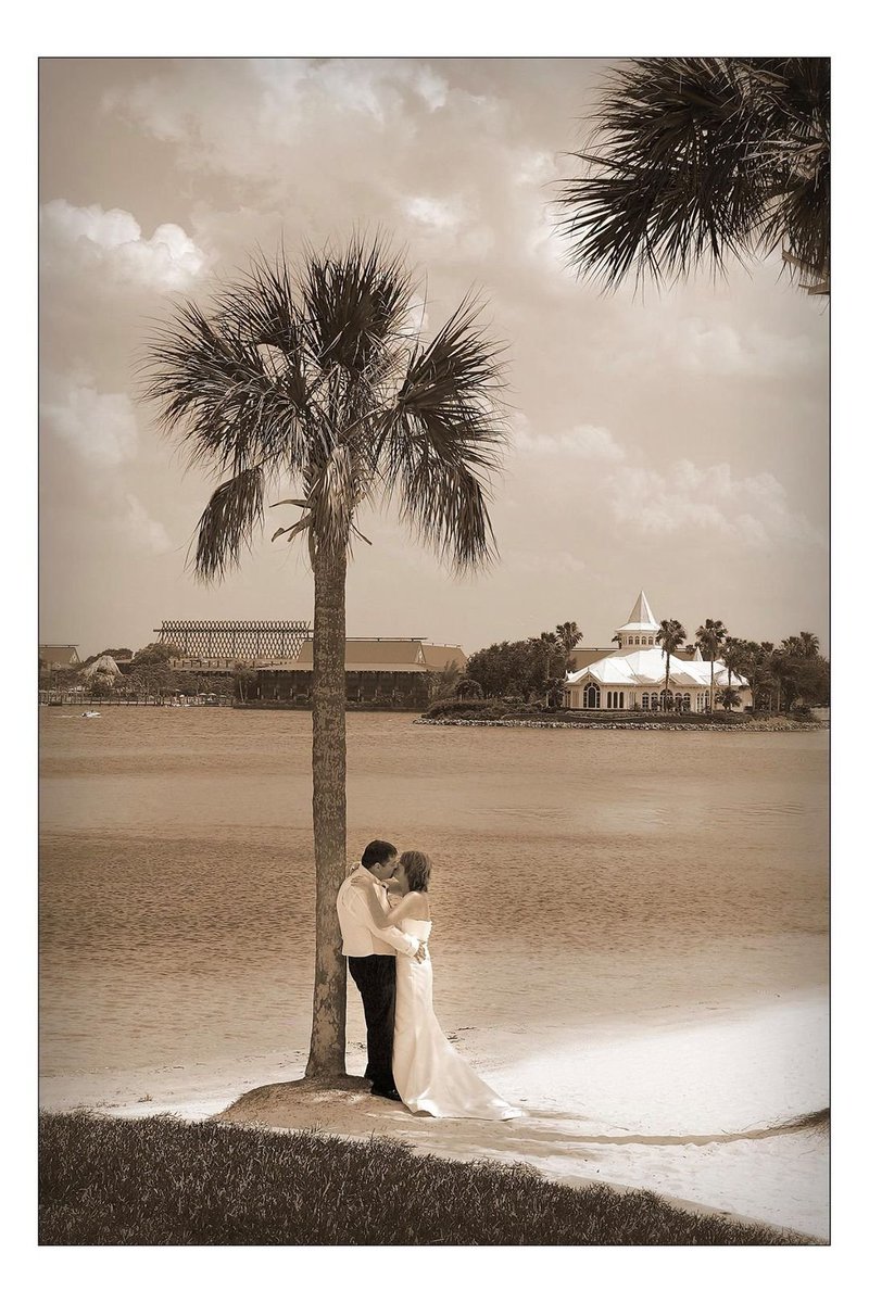 Pazmuzak's tweet photo. Tied the knot 16 years ago at the Grand Floridian Hotel in Orlando.......wedding chapel in the background.......boy, where has the time gone? ❤️❤️ #Disney #Grandfloridian #Florida #May2006 https://t.co/lK3JwaMl3H