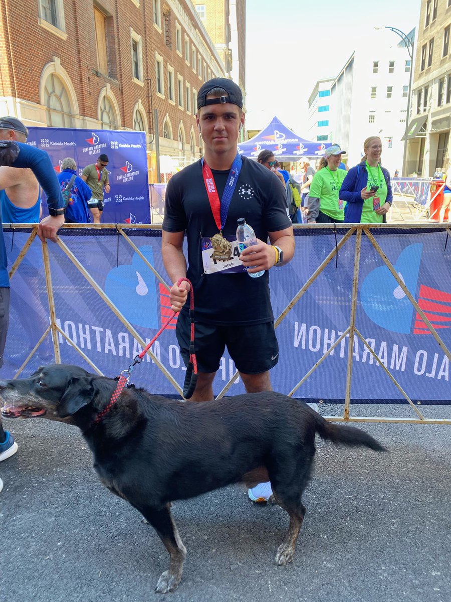 SCPride_Wrestle's tweet photo. Congrats to 2022 graduate, Jake Harry on running his first marathon today in 3:47! He met his dog, Tank at the finish line to celebrate 💪

He applied the same consistency &amp; focus in marathon training that he did in the room everyday. Future is bright for this young man! https://t.co/S1NlzydmLk