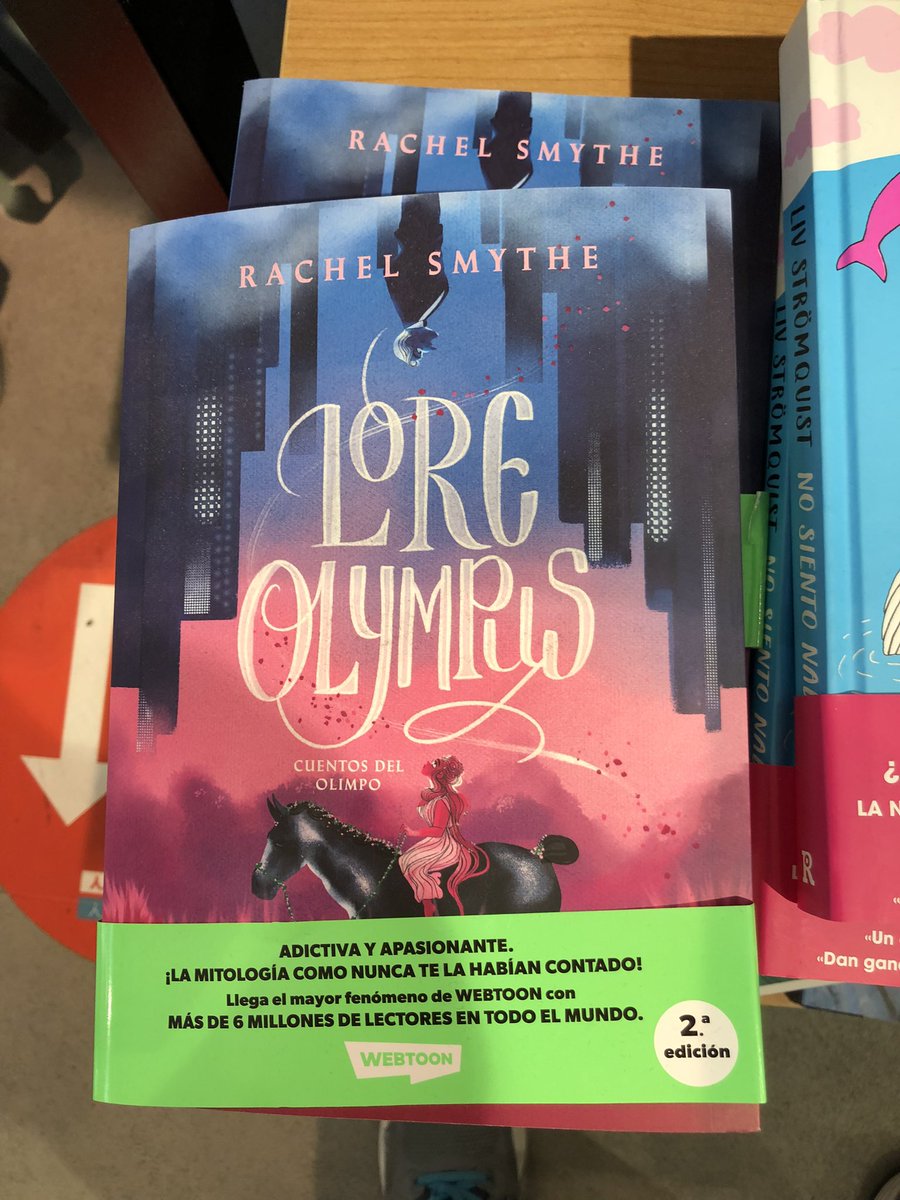 Fun to see this out in the world! Found at the Barcelona airport Hudson. <a href="/used_bandaid/">RachelSmythe @ Lore Olympus</a>