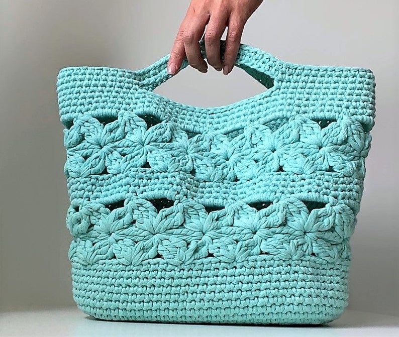 Designer Spotlight: Crochet Purses and Poufs, Patterns Designed By Tatiana of isWoolish: 👉 buff.ly/3vBRjPZ #crochet #handmade #diy