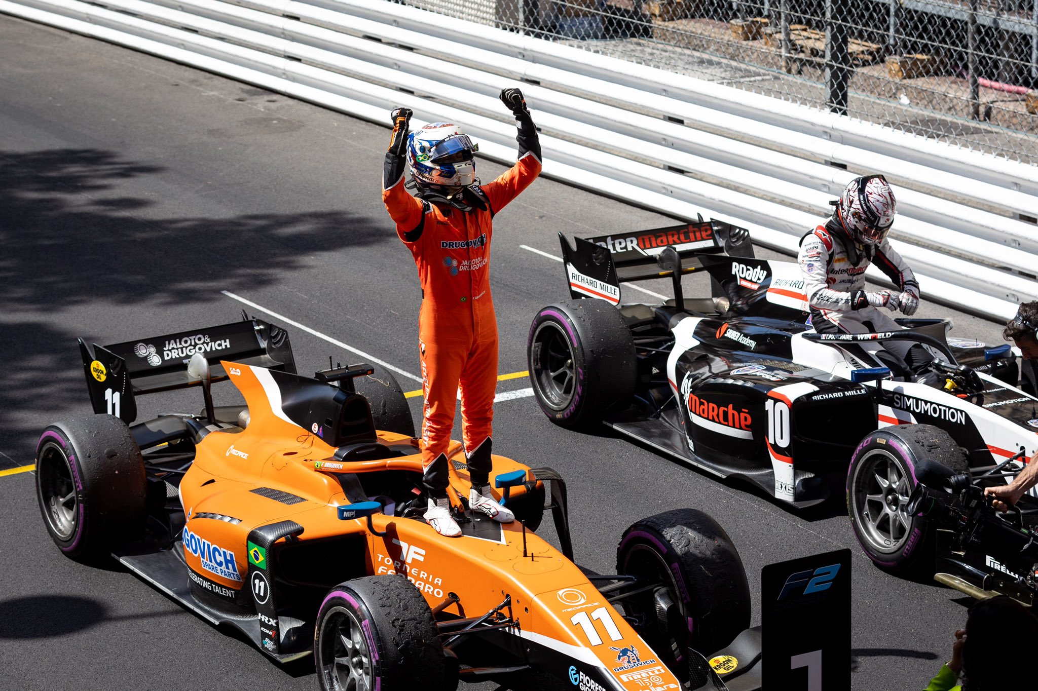 Brazilian Felipe Drugovich of MP Motorsport celebrates winning the 2022 F2 Feature Race at Monaco ahead of title rival Théo Pourchaire