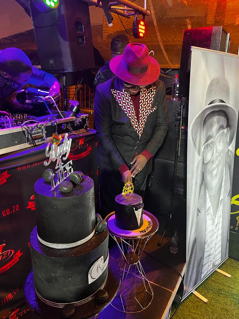 jozifm's tweet photo. Dr. Mpho Mhlongo cutting the cake at his party #Party4Life #AllBlack #BlackByPopularDemand #EZolaThreePubAndGrill #JoziFmCares MM https://t.co/7JdyDnZN4R