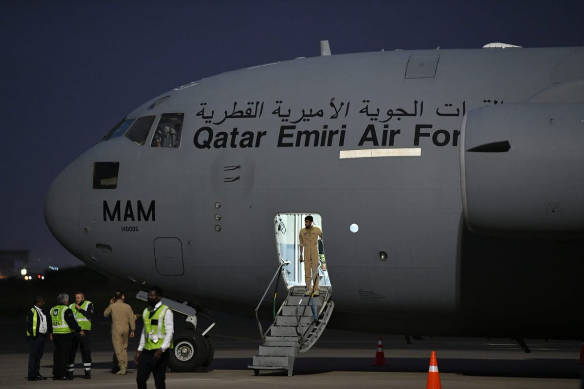 NationalCoGTA's tweet photo. This evening, a cargo plane carrying humanitarian aid by the State of Qatar, which comprises foodstuff, clothing, and medical supplies arrived at King Shaka International Airport in @eThekwiniM received by 🇿🇦 Government leaders and the 🇶🇦 Ambassador to South Africa #Flooods https://t.co/E3fANN3KjR