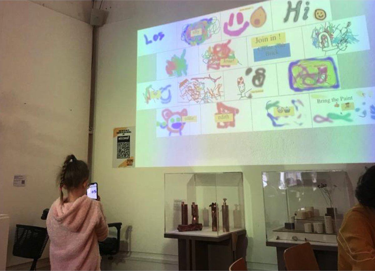 whizwall's tweet image. Fantastic for whizwall to be a part of the inspiring Bring the Paint Street Art Festival in Leicester. Whizwall was sited in the family area of the @lcbdepot and it was amazing to see so many young children engaged with creating their own augmented reality bricks on the whizwall.