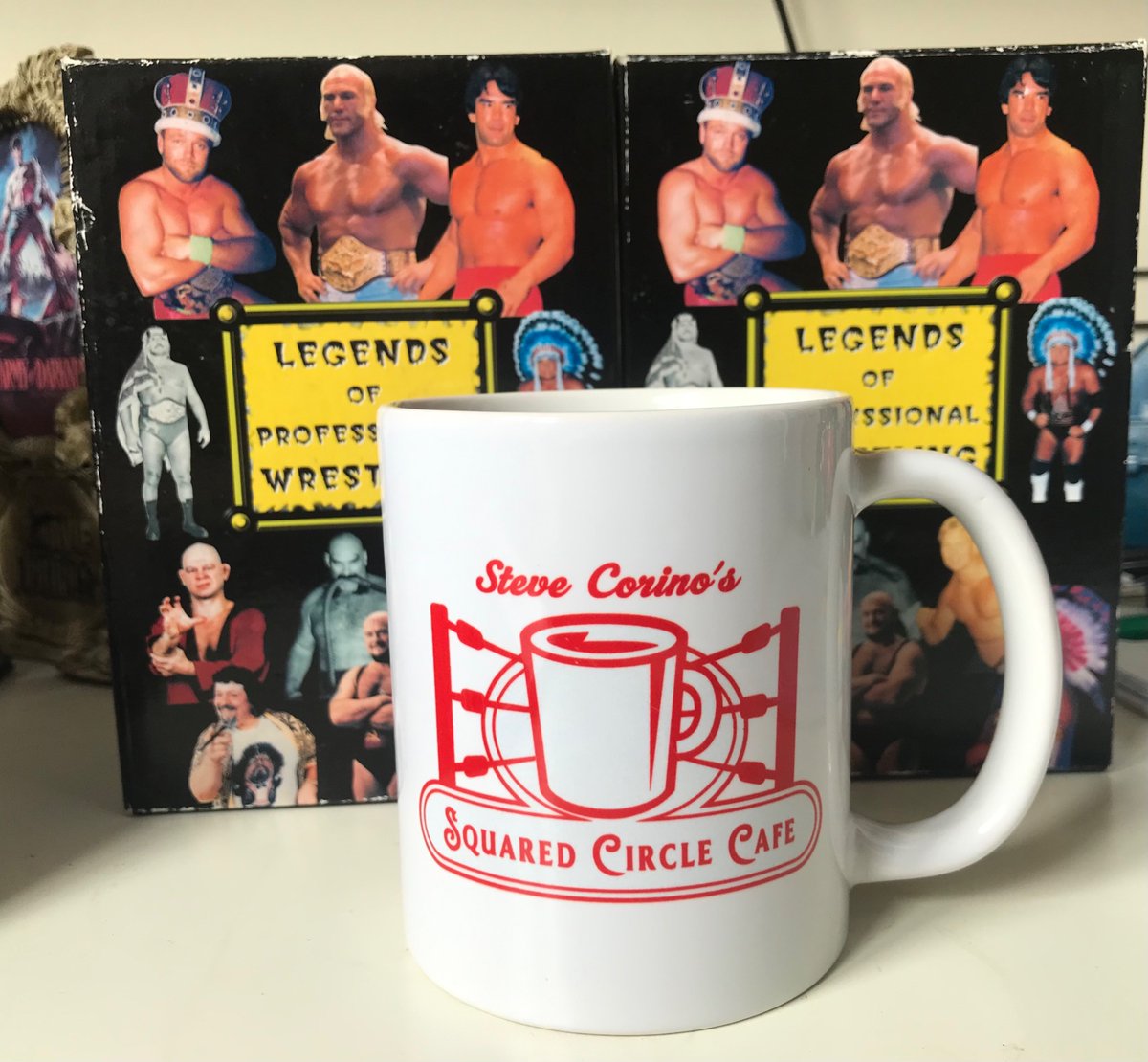 Exposing the business by drinking tea from my <a href="/SqCircleCafe/">Squared Circle Cafe</a> Steve Corino coffee mug.