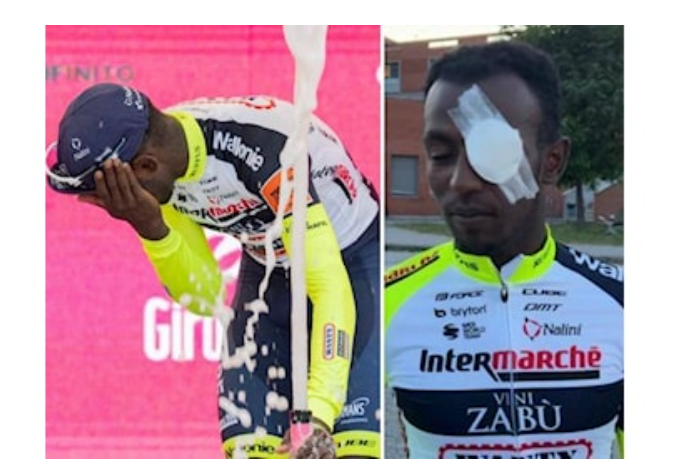 anderiza's tweet photo. A menudo me preguntan si los Giros actuales ya no dan historias rocambolescas como los antiguos. Biniam Girmay se convierte en el primer ciclista negro en ganar una etapa y se retira por el taponazo del corcho en el ojo durante la celebración en el podio. Chúpate esa, Girardengo. https://t.co/KsQzJlQqrX