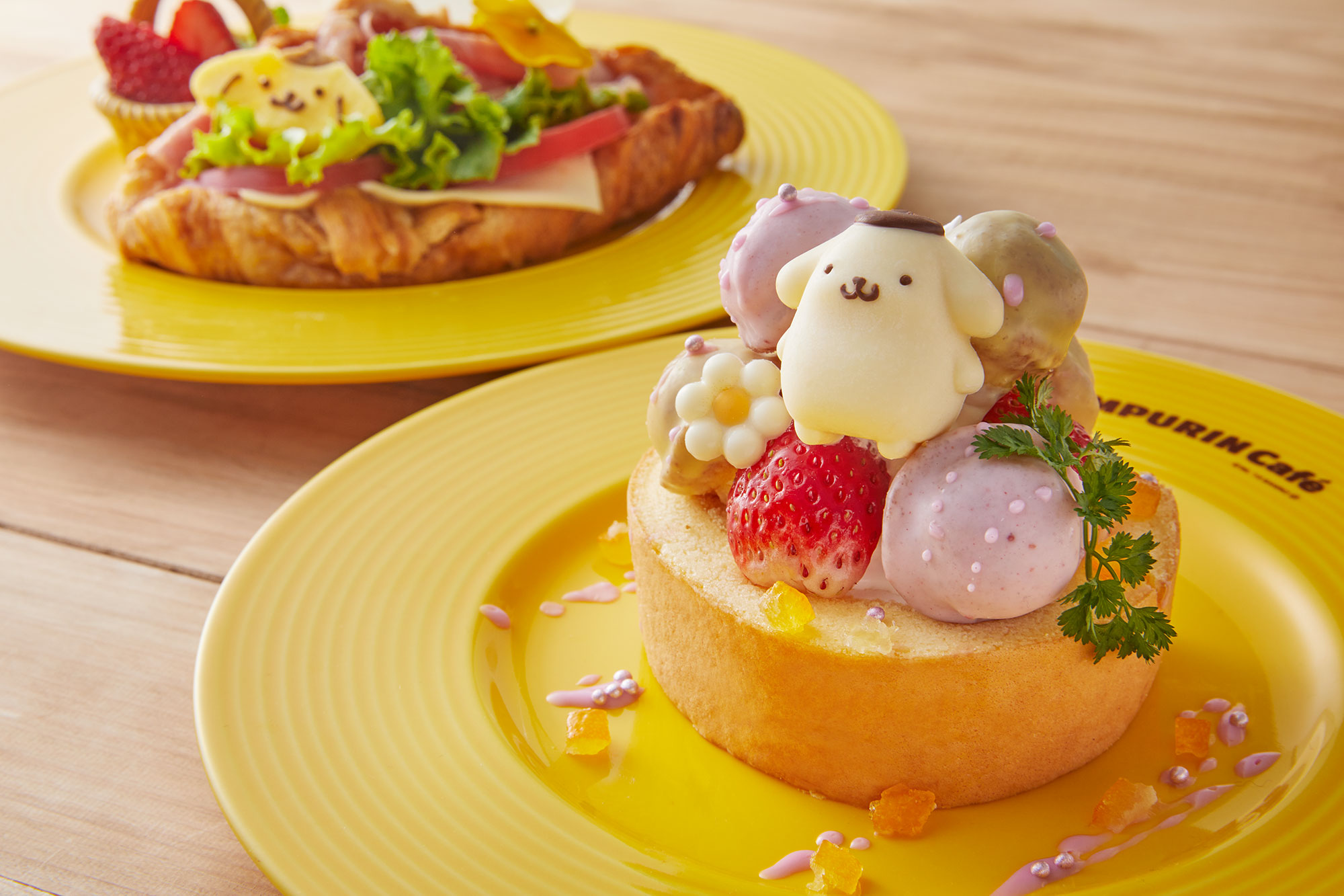 ポムポムプリン カフェ原宿 22springスペシャルデザート ふわふわのスフレロールケーキにカラフルなボールカステラといちごを添えたとってもかわいいデザートです ポムポムプリンと一緒に春の訪れを感じてください プリンくんのスプリング