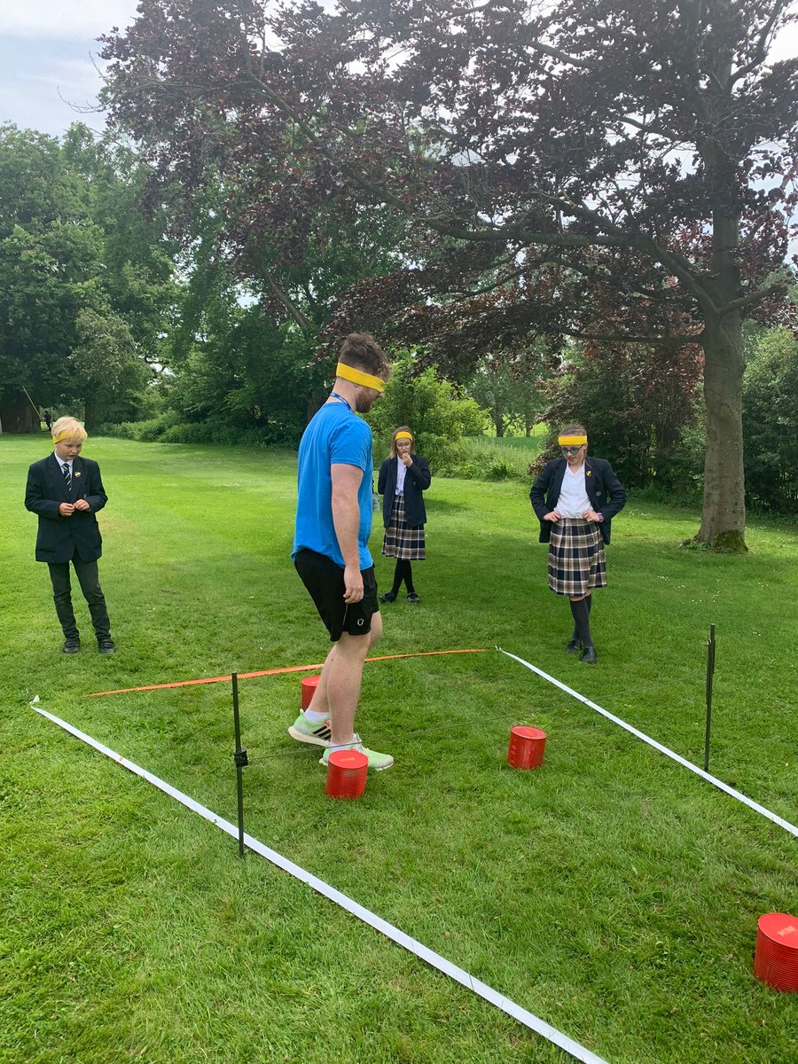 Sharp_Bredon's tweet photo. More action from the onions this morning. Here are some of Sharp House Year 7s guiding Max (Old Bredonian) around a minefield course. #communication #teamwork #teambuilding https://t.co/F98gIAezDn