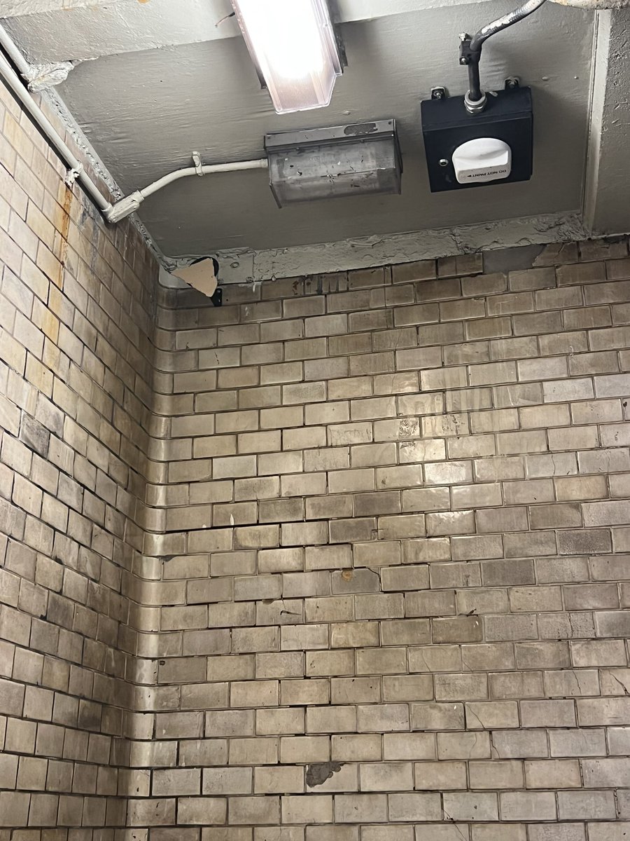 So this mirror - a pretty basic safety feature - at the Rector St R station exit has been covered in cardboard for months. Do better <a href="/MTA/">MTA</a> <a href="/NYCMTA_Problems/">MTA Problems</a>!