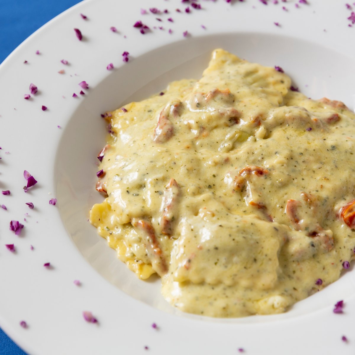 BlueOliveGT's tweet photo. Creamy, delicate &amp; rich, with hints of saltiness from the Aegean sea, Ravioli Santorini is one of our favourite Greek dishes. 🌊 Ravioli pasta stuffed with spinach tossed in a sun-dried tomato cream sauce; the best food for a Wednesday night dinner! https://t.co/hEIJXLKOcR