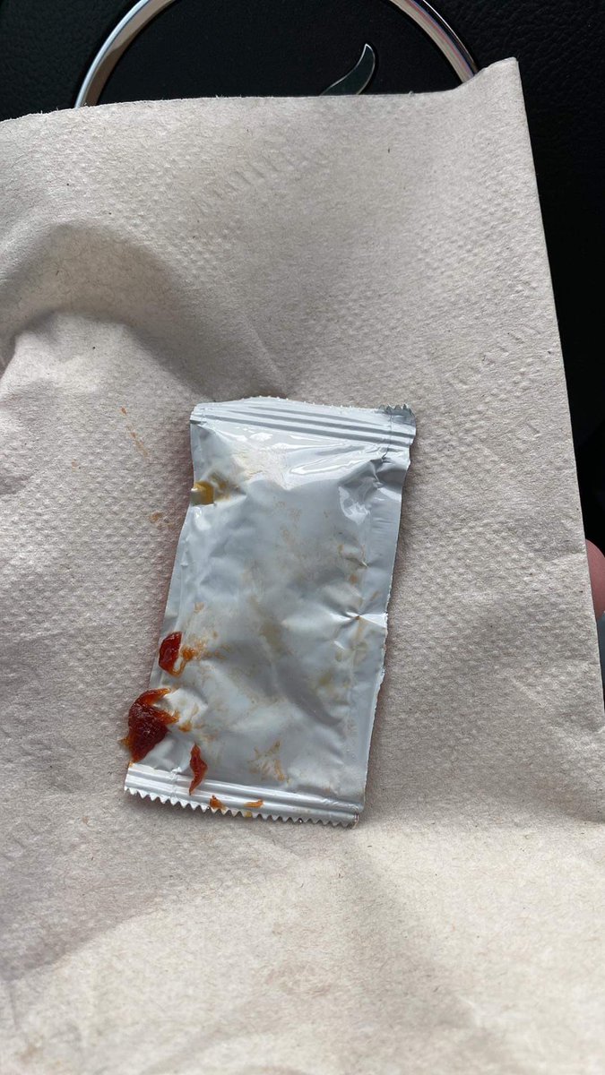 nickcuban's tweet photo. @McDonalds is it that hard to not give us the exploded ketchup packets? Everything gets covered in sticky old ketchup. https://t.co/6vxMchfwcQ