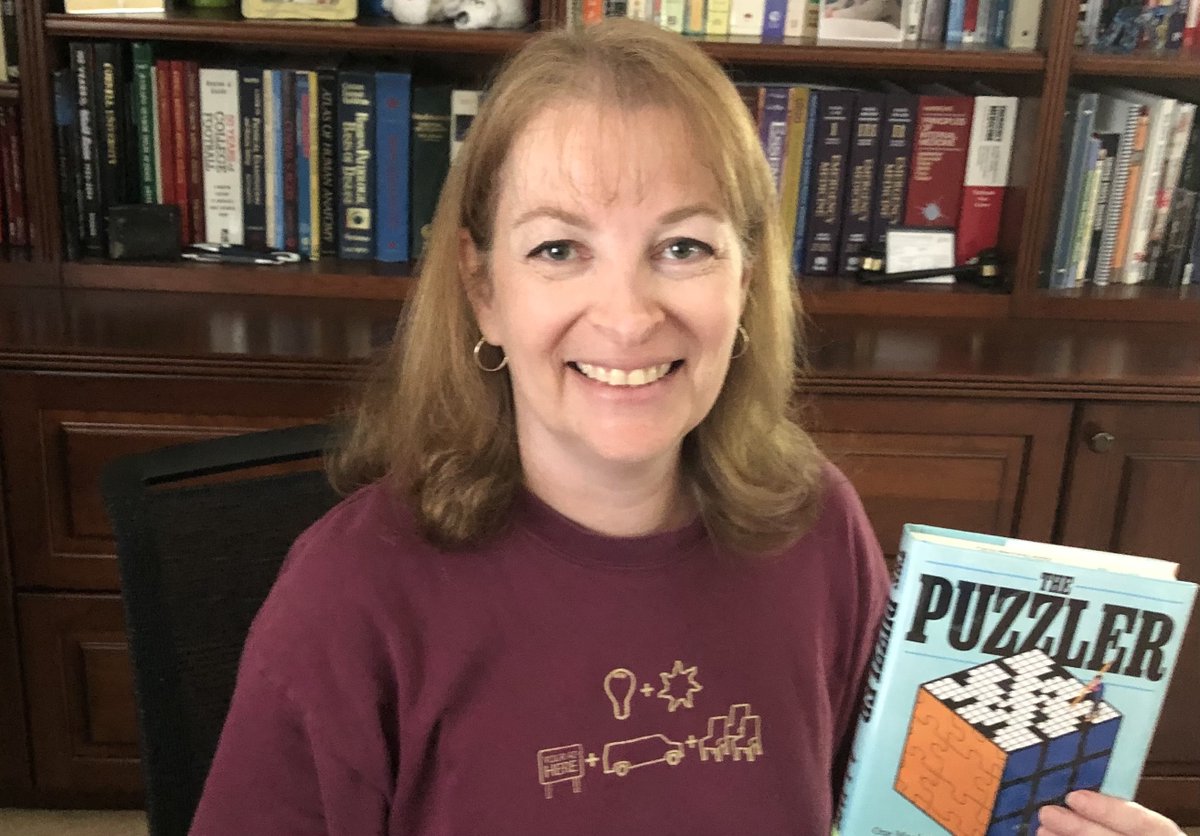 Robynw414's tweet photo. When you're reading The Puzzler by @ajjacobs (because you make puzzles-- but also because it's a great book) and learn that the author's wife is the President of Watson Adventures while you're wearing your Watson Adventures shirt! https://t.co/JD9RapXjFc