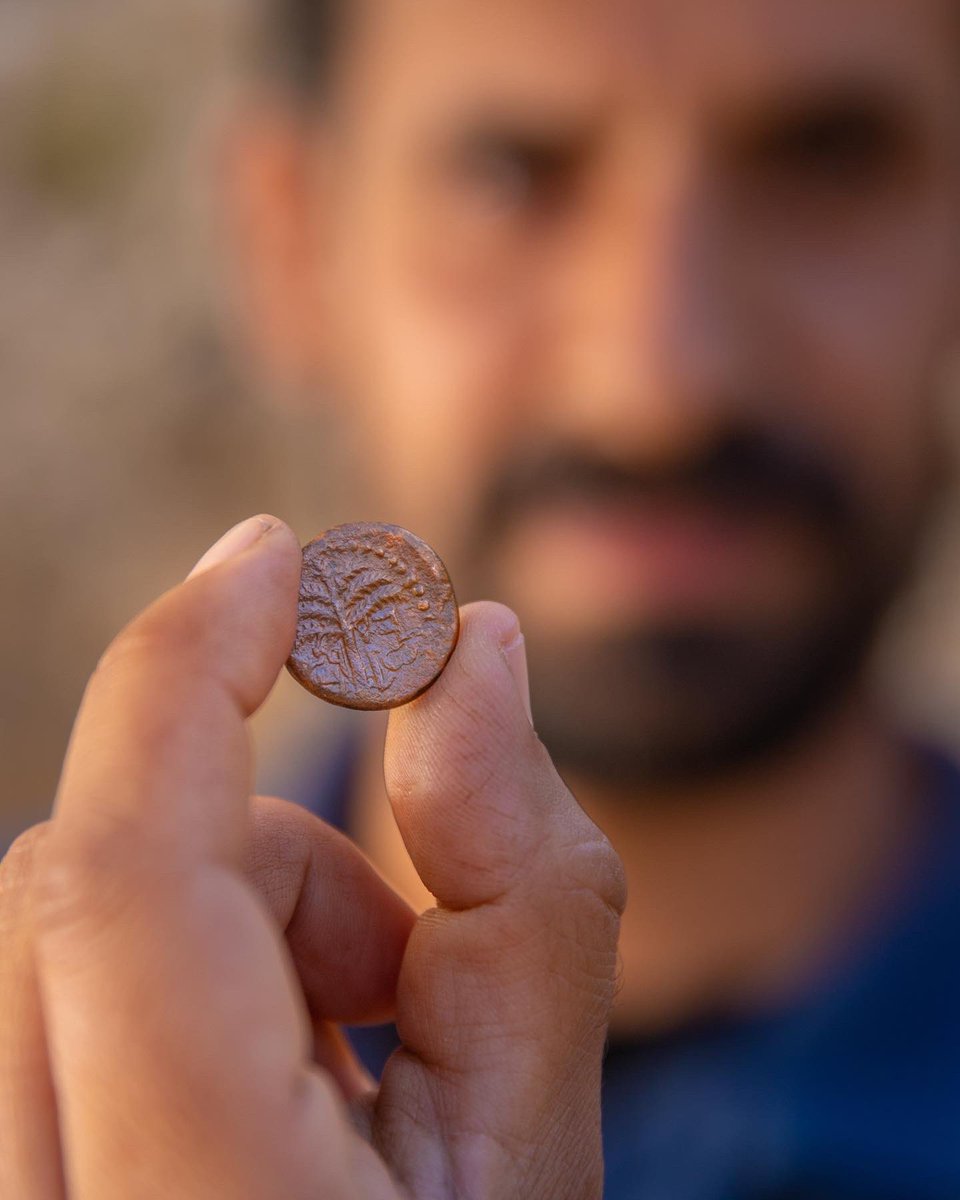 🔥As you sit around your Lag B'Omer bonfire today, remember the history behind the BBQs! 🔥 Here at The City of David, we discovered a rare bronze coin from the period of the Bar Kochba Revolt (around 132 CE). 🪙 📸Koby Harati, COD Archive