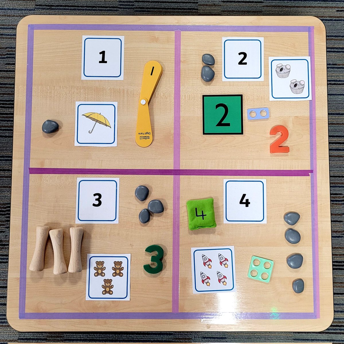 MissWilson9's tweet photo. We've transformed our maths table into a sorting activity. The children use our number baskets and maths resources and put them in the correct square. We are excellent mathematicians! #cravenwoodeyfs #earlyyears #earlymaths @CravenwoodPAcad https://t.co/soJHkvhvqC