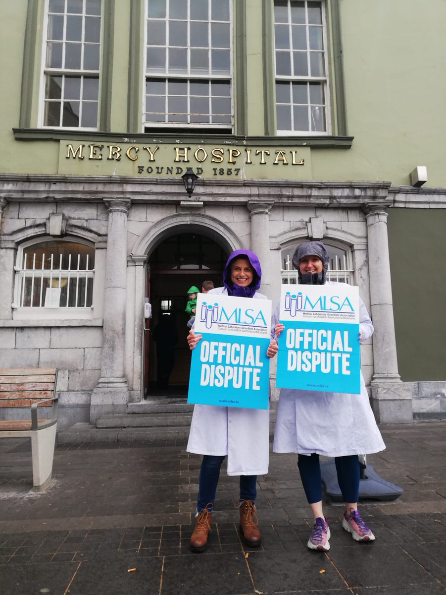The rain doesn't dampen the spirits of Medical scientists working in the Biochemistry department who seek nothing more than parity in pay and career opportunities