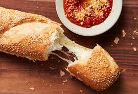 Menu change for Thursday: Cheesy bread w/marinara sauce, salad w/dressing, corn, &amp; fruit