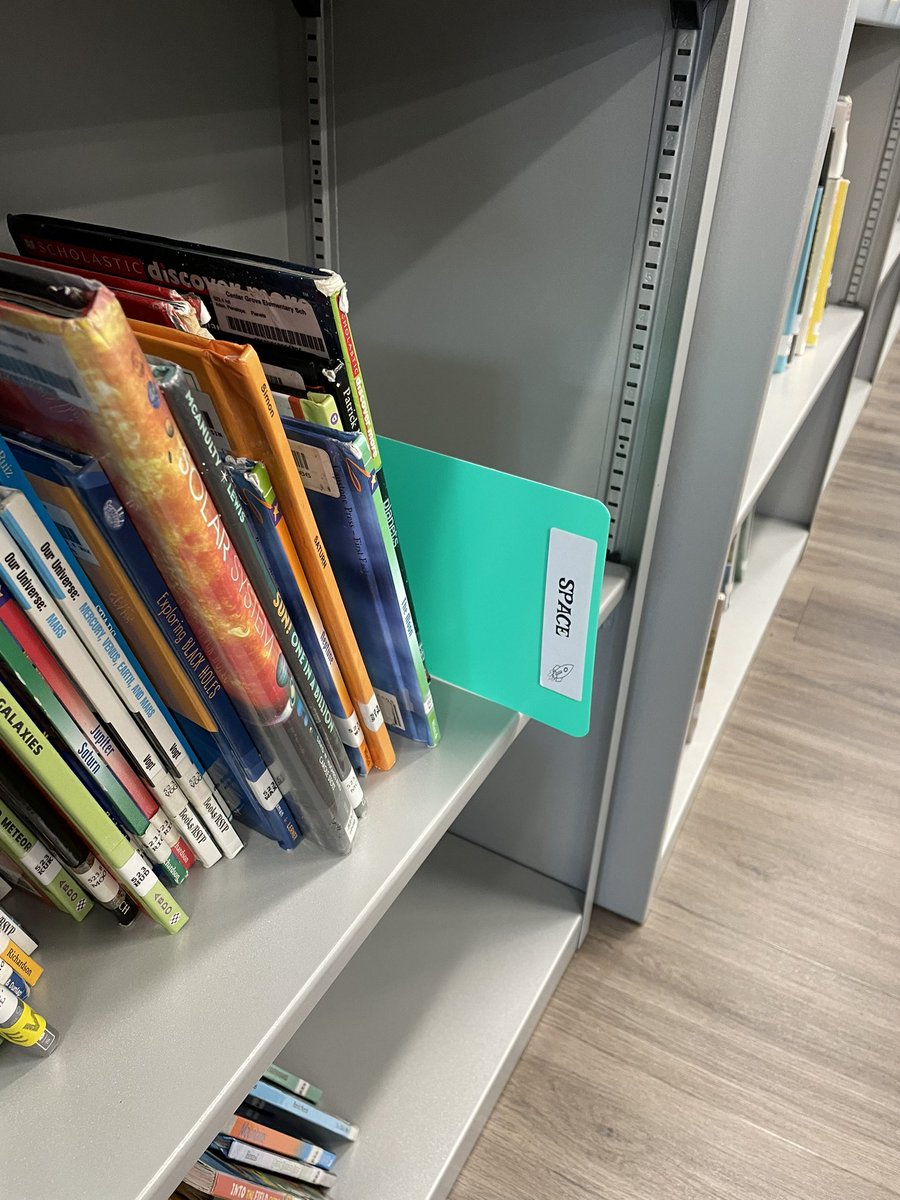 I keep trying new label ideas and the day I added this to a shelf, a student came over to tell me how easy it was to find his space book. Maybe it sounds silly but that really helped me keep working on this! Students will read more if they can search independently and easily!