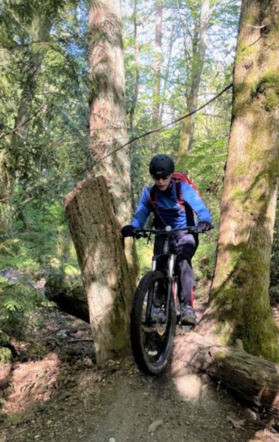 Prevail_PT's tweet photo. Happy HUMP day from us and Tom at Big Finn Hill Park in Kirkland. He says "The trail zigzags through these trees, over the log, and then gets gnarly." 

Hope the rest of your week is smooth sailing / not gnarly! 

#prevailpt  #humpday #wednesday #mtb #mtblife #mtblove https://t.co/UYhJZs3G6m
