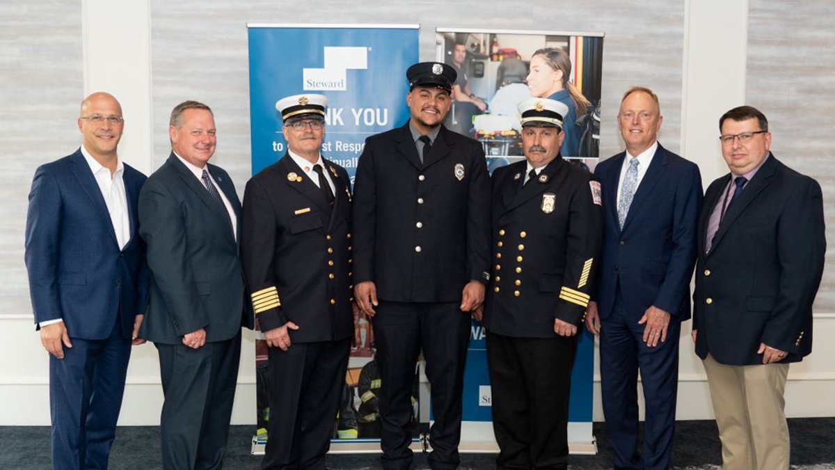 SaintAnnesHosp's tweet photo. Andrew Perez, a Fall River Fire Department EMS EMT (center), was honored with the "Steward of the Community" award at this week's @StewardHealth #NationalEMSWeek celebration. Andrew was twice nominated for outstanding professionalism and compassion. Congratulations! https://t.co/PUPoaXwa8e