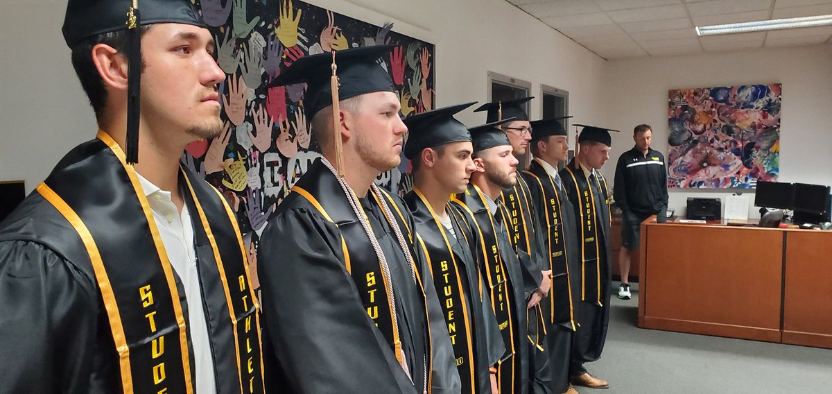 uwochancellor's tweet photo. Needed an extra inning this morning to provide @UWOBaseball grads some gear. They couldn't participate in @uwoshkosh Commencement last Sat. due to the @wiacsports title game. So, we rearranged the office a bit, invited their families and made it work! Congratulations! https://t.co/xMqU9YxwgB