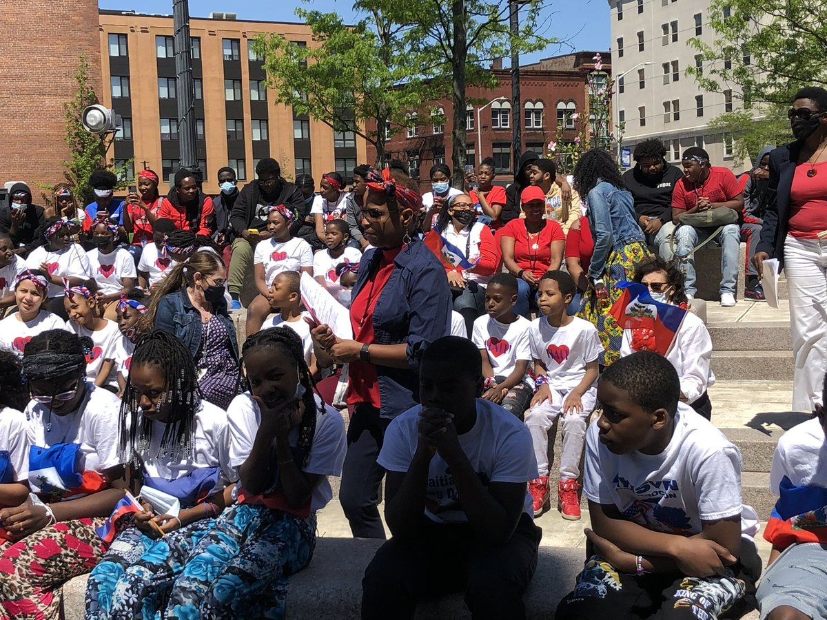 PlymouthCtyDAO's tweet photo. On this beautiful, sunny day we are honored to stand with the Haitian community of Brockton and honor the flag. 🇭🇹 https://t.co/K1yJUSGggD