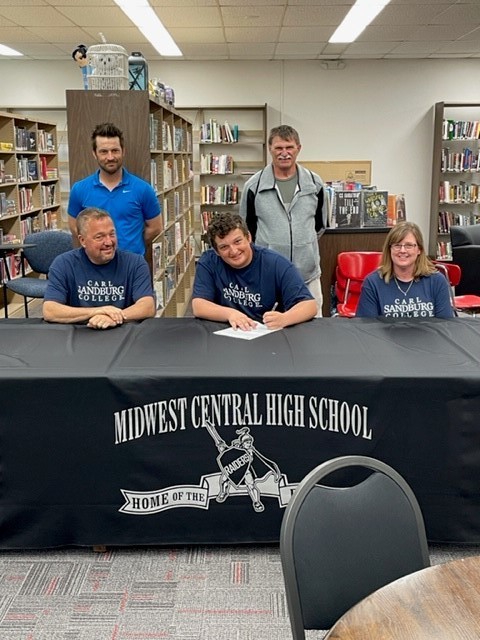 MCRaiderNation's tweet photo. Kyle Uselton signed with Carl Sandburg on Friday to play baseball for the Chargers next year.  Midwest Central is proud of Kyle's accomplishments and wishes him the best of luck in his future. https://t.co/Fstvim9zd6